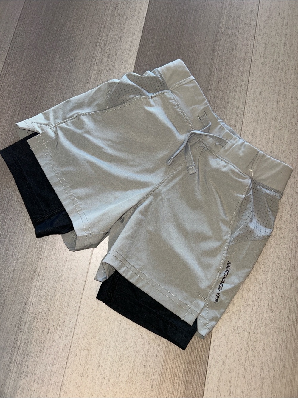 abercrombie kids light gray athletic shorts with black liner